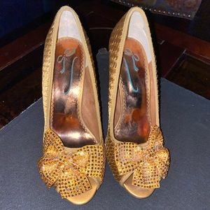 Poetic License, peep toe shoes- embellished bow.